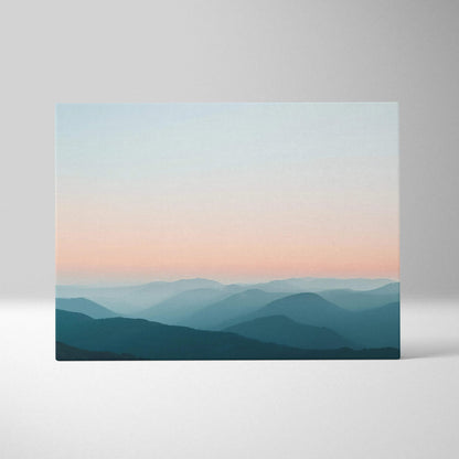 Modern minimalist canvas wall art of serene blue mountain landscape at sunrise decor.