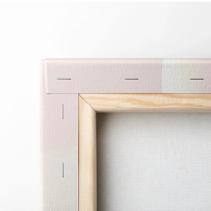 Corner detail of minimalist pink desert dunes digital canvas wall art with wooden frame and white decor background.