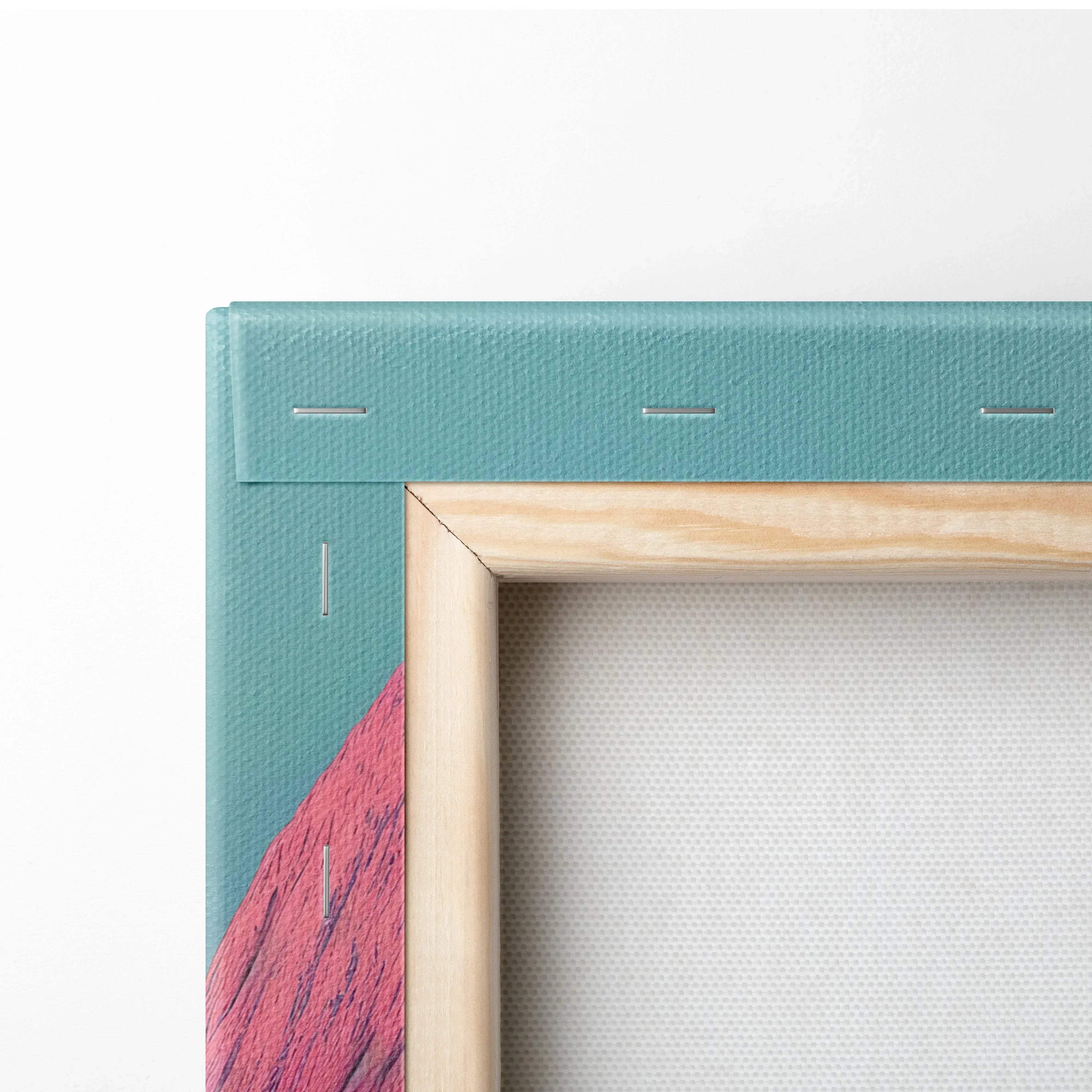 Close-up of teal textured canvas wrapped around a wooden frame with visible staple details and a glimpse of pink abstract.