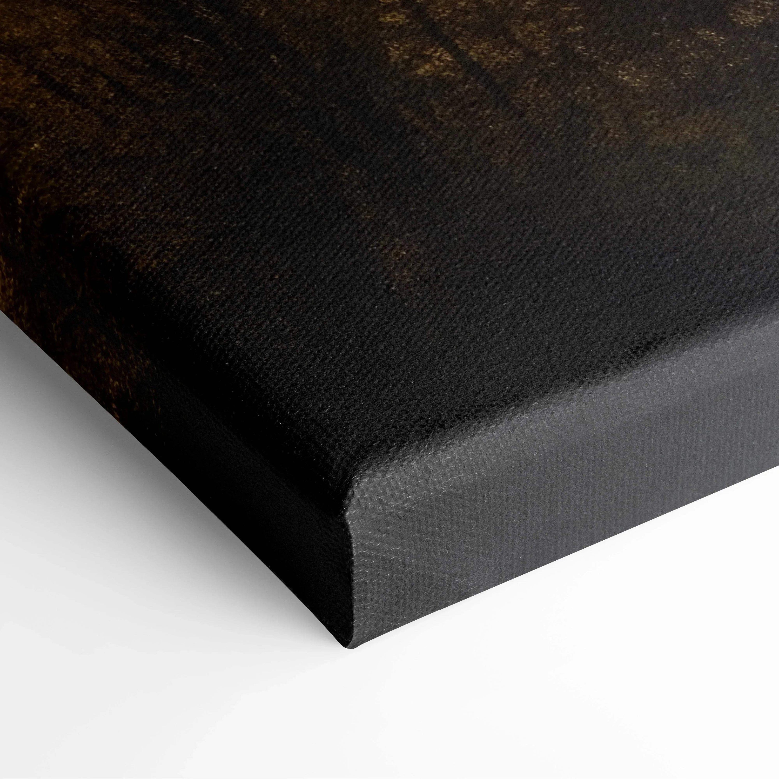 Close-up of black textured canvas corner with modern wall art detail and sharp edges.