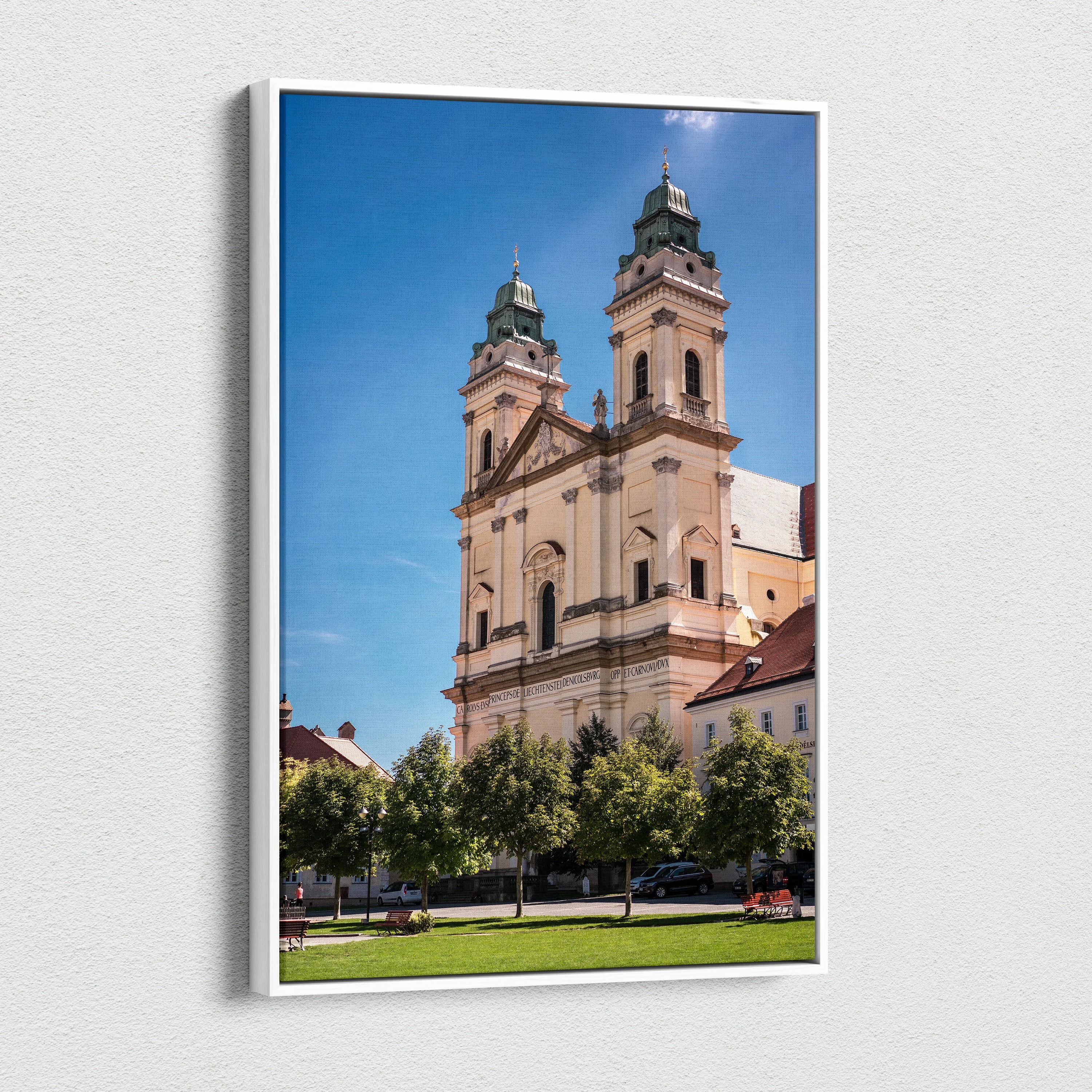Vertical canvas wall art featuring iconic historic building with twin towers against bright blue sky.