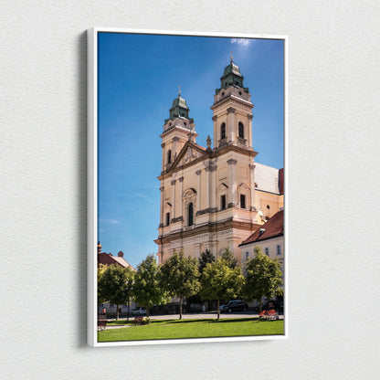 Vertical canvas wall art featuring iconic historic building with twin towers against bright blue sky.
