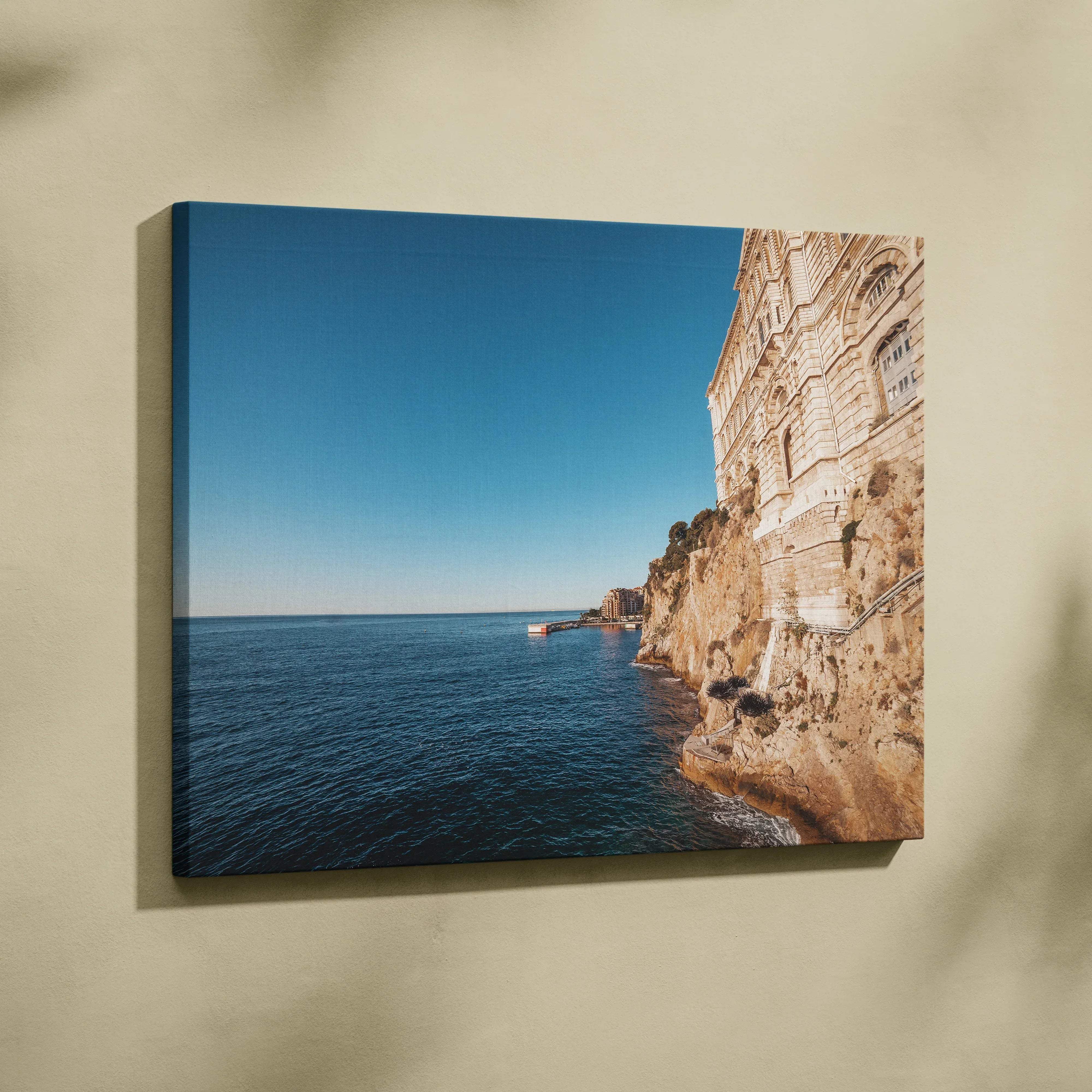 Canvas print of Monaco coastline with Oceanographic Museum on cliffs over blue sea