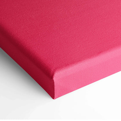 Pink canvas stretched over wooden frame for wall art decor.