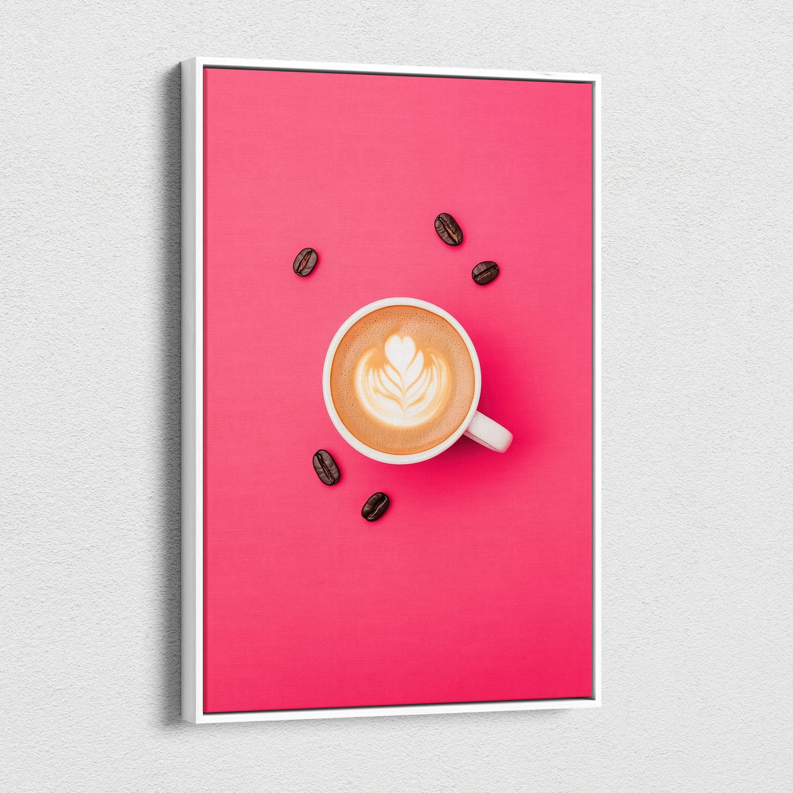 Canvas wall art featuring a steaming latte with heart-shaped foam, surrounded by coffee beans on a vibrant pink background.