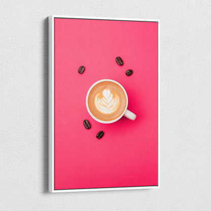 Canvas wall art featuring a steaming latte with heart-shaped foam, surrounded by coffee beans on a vibrant pink background.