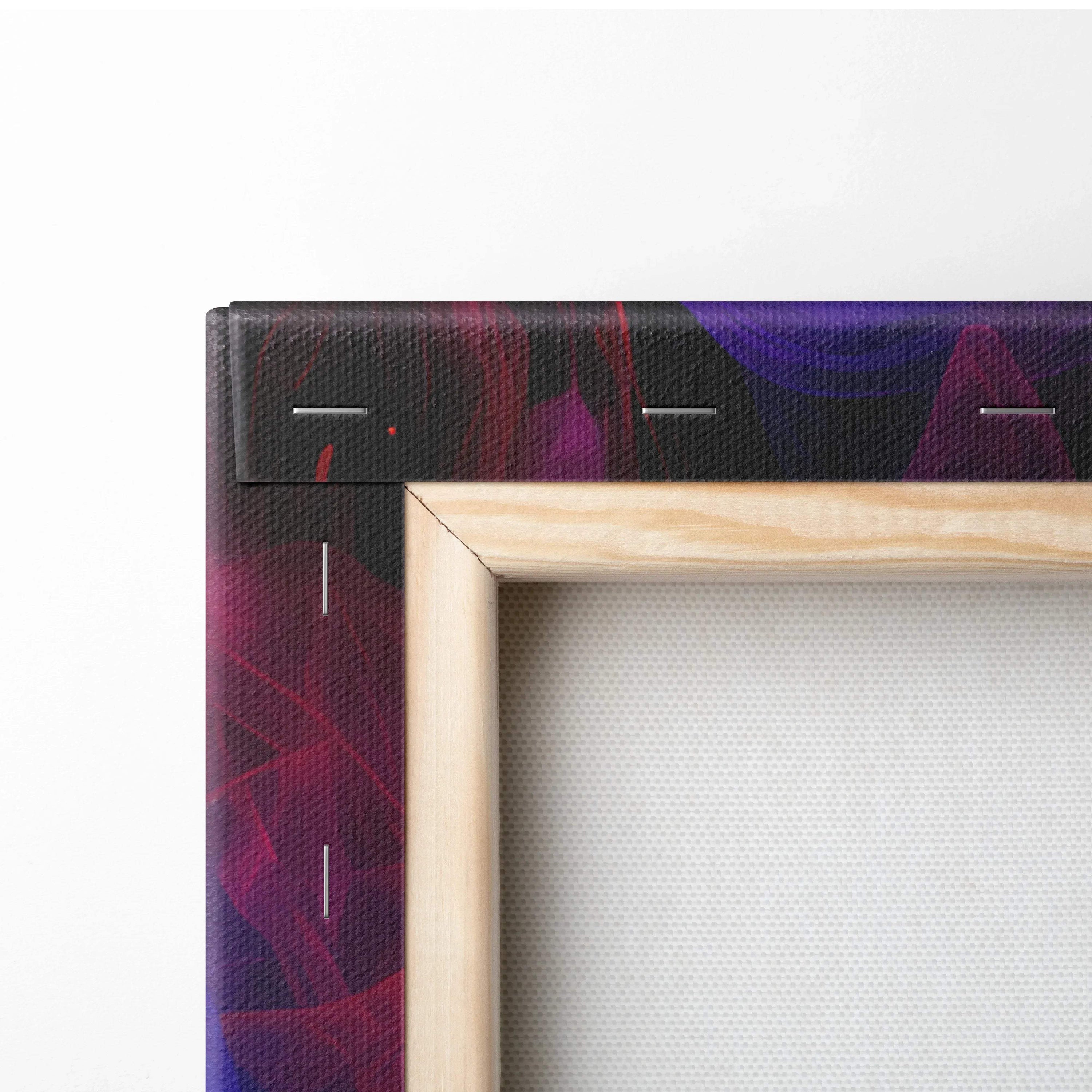 Close-up of a stretched canvas with wooden frame showing vibrant abstract digital art in deep purples and reds.
