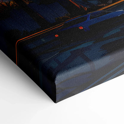 Close-up of textured canvas wall art featuring abstract dark blue and black shapes with sharp orange accents and digital.