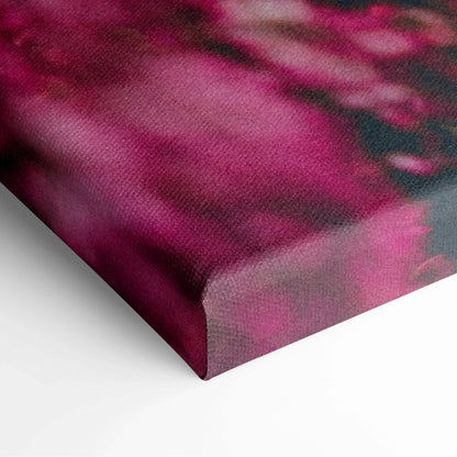 Close-up of high-resolution cherry blossom canvas wall art with vibrant pink and red floral decor.