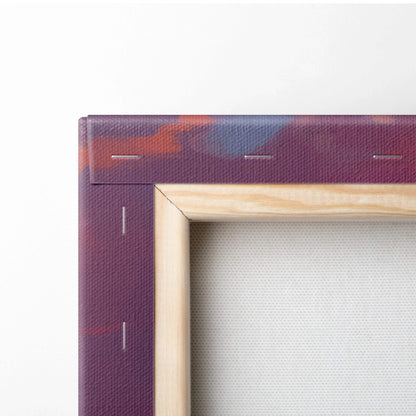 Serene sunset lakeside canvas art with purple orange abstract design in wood frame
