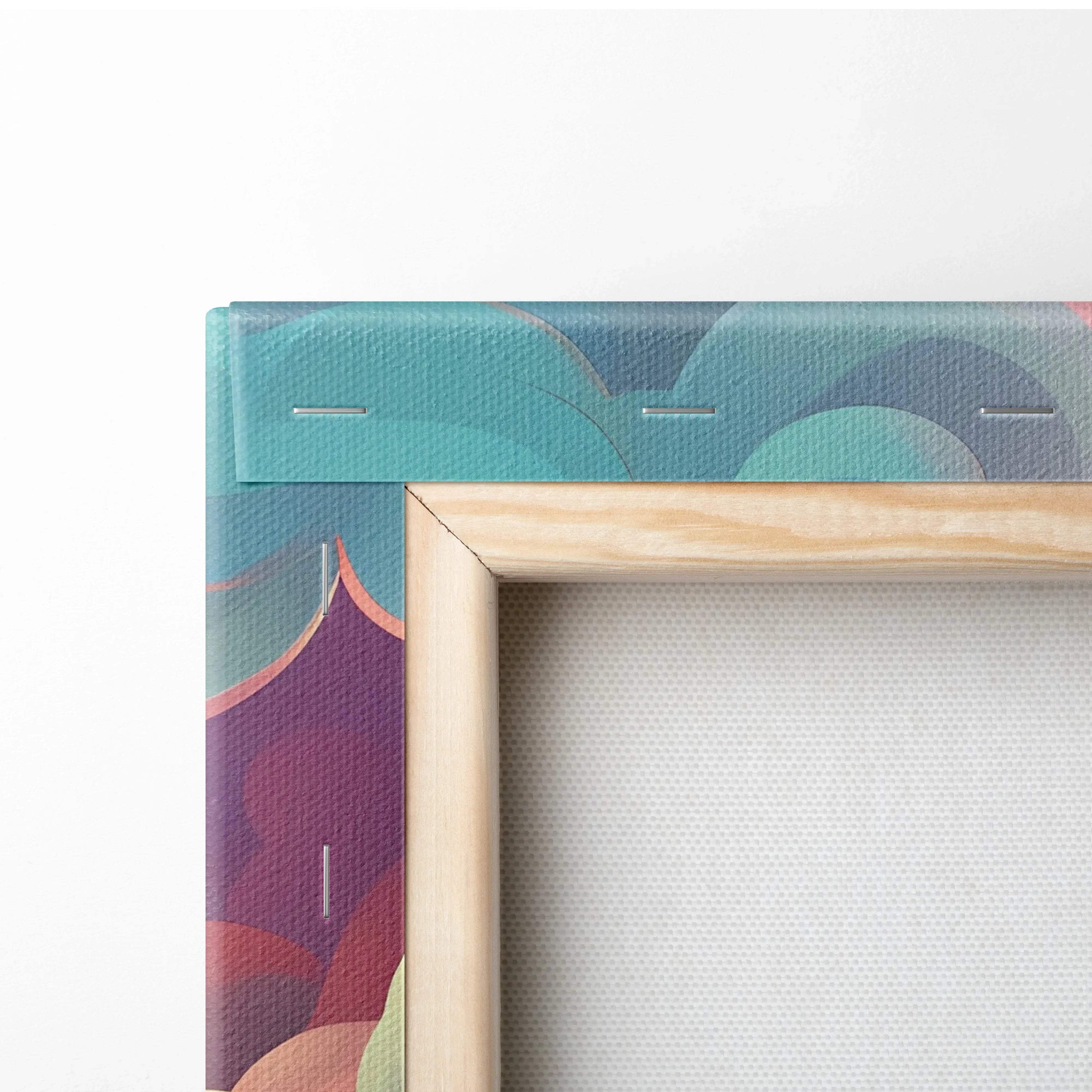 Close-up of a vibrant abstract canvas art corner with layered teal, blue, and purple shapes on wooden frame.