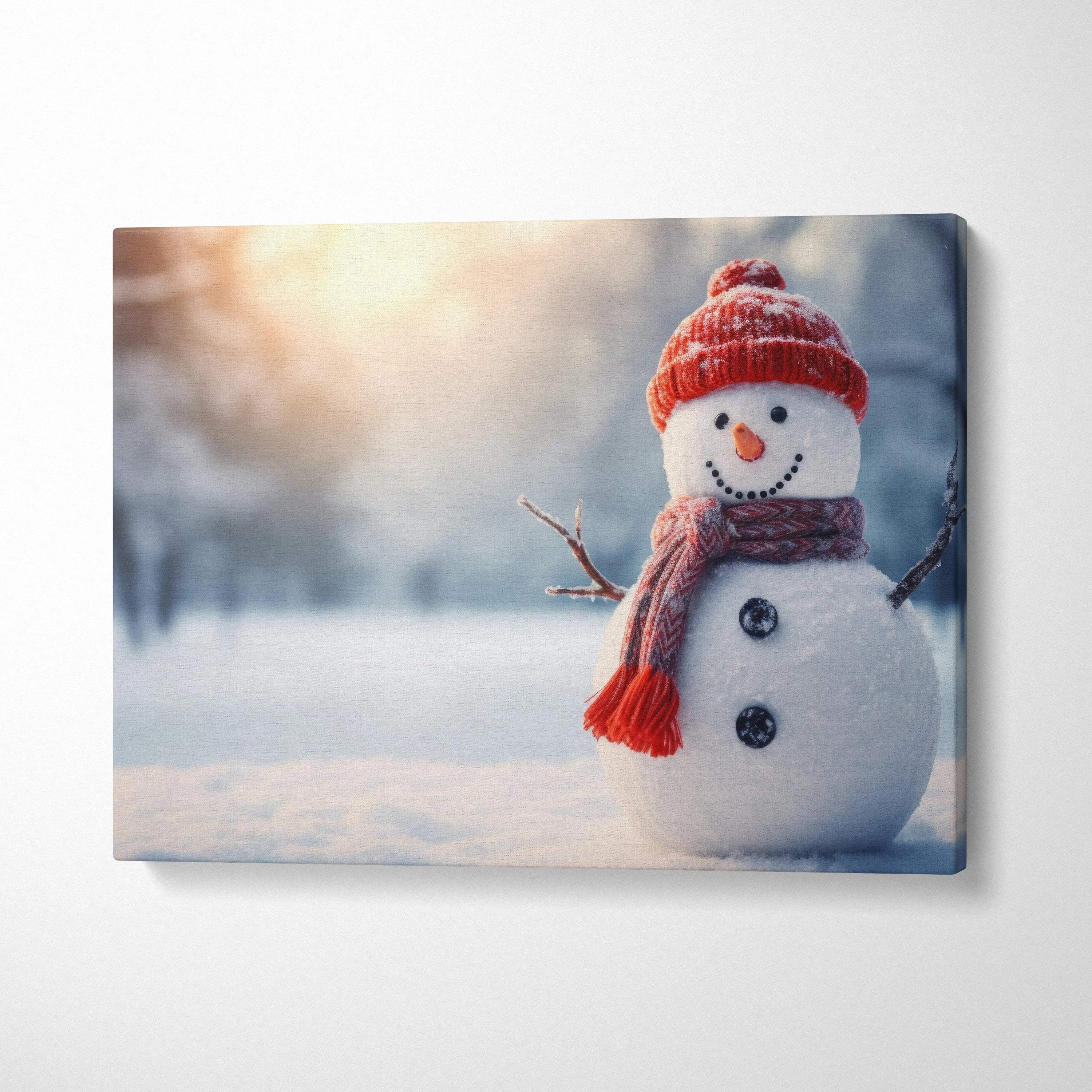 Cute snowman wearing red hat and scarf in snowy landscape canvas wall art decor.