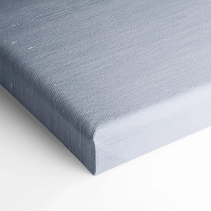Close-up of textured gray canvas edge for digital winter snowy trees wall art decor.