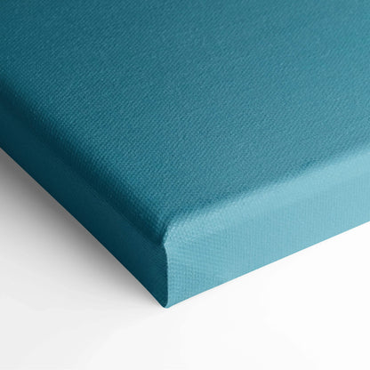Teal canvas wall art close-up showing textured fabric and wrapped edges for elegant decor.
