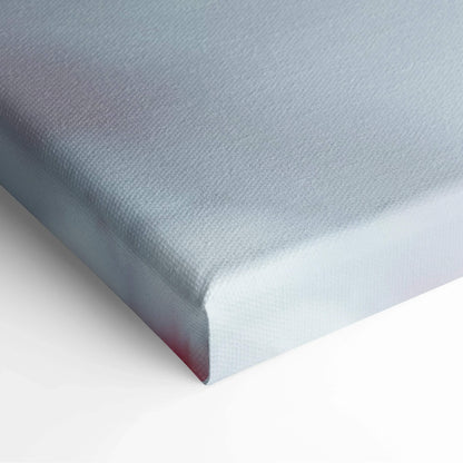 Close-up of white stretched canvas corner with crisp edges, showcasing smooth texture for wall art decor.