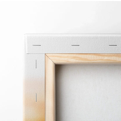 Close-up of wooden frame and white stretched canvas for wall art print.