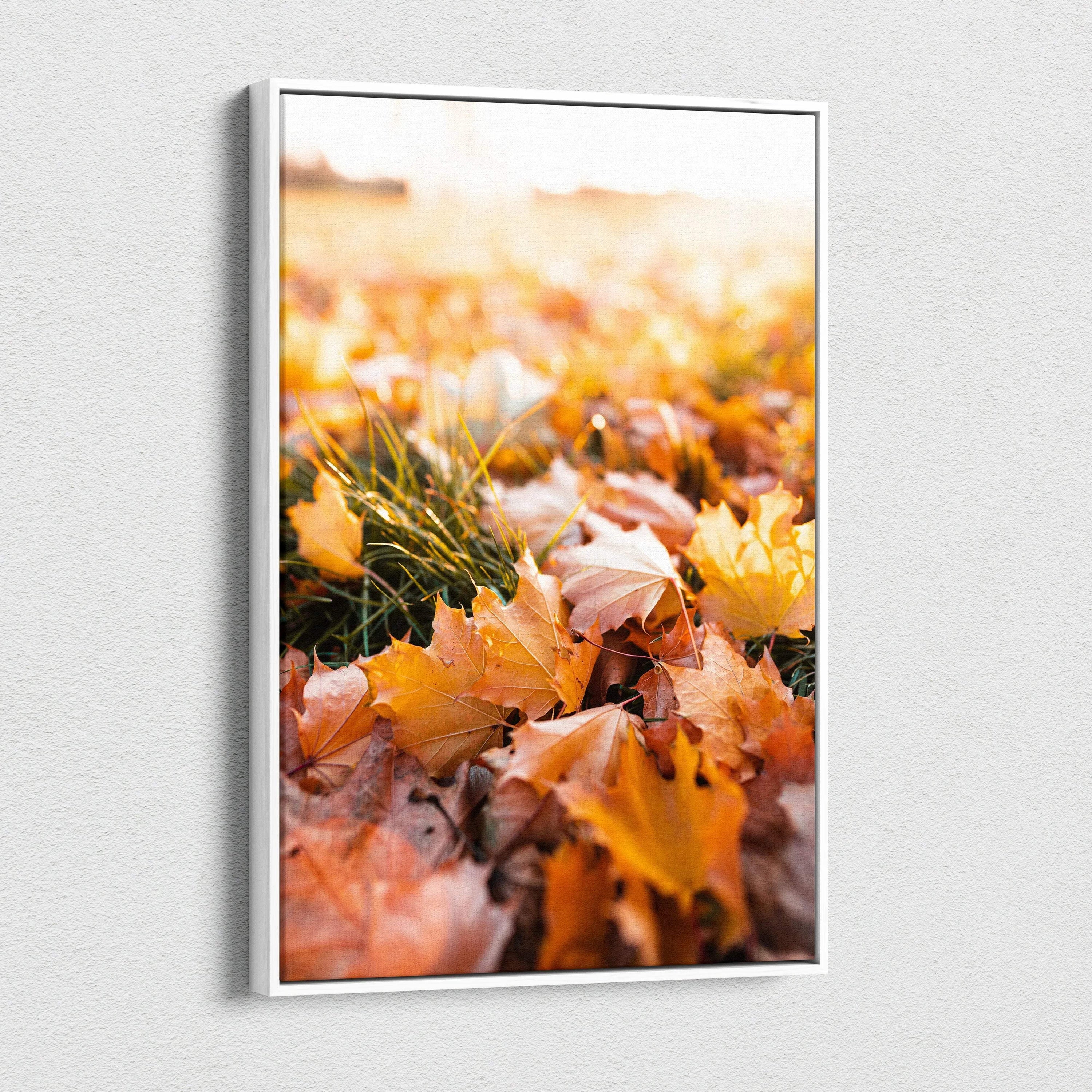 Vibrant autumn leaves close-up canvas art with warm orange and yellow tones, vertical wall art.