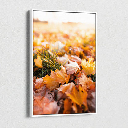 Vibrant autumn leaves close-up canvas art with warm orange and yellow tones, vertical wall art.