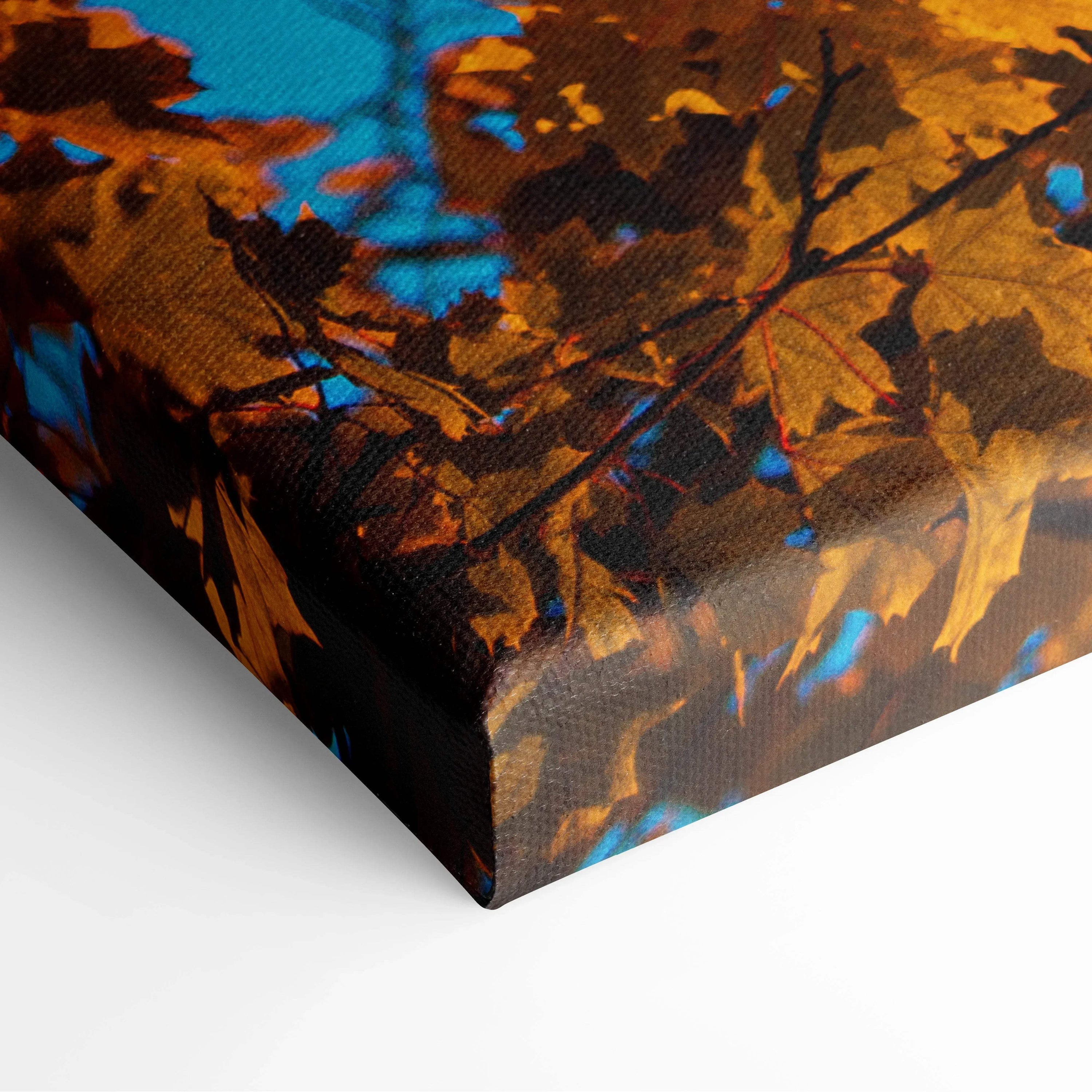 Canvas art print featuring golden autumn leaves with vibrant blue background, warm fall colors wall art.