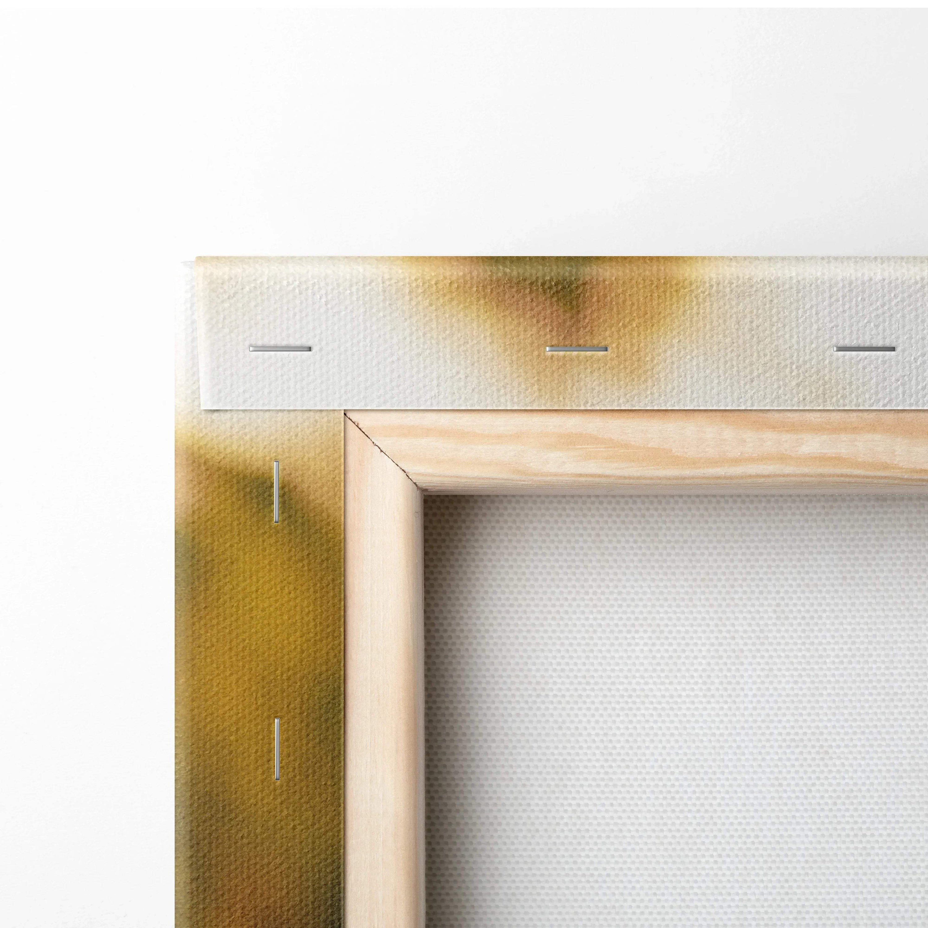 Close-up of canvas wall art corner with wooden stretcher frame and food-themed print edges in warm tones.
