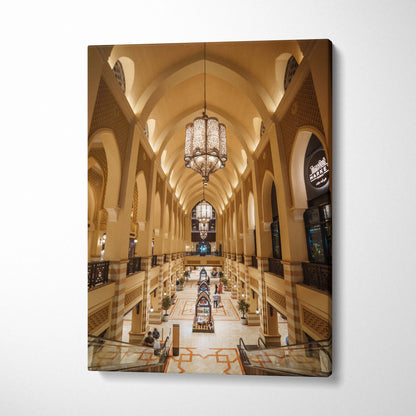 Vertical canvas wall art featuring warm-toned architecture with ornate arches and chandelier lighting.