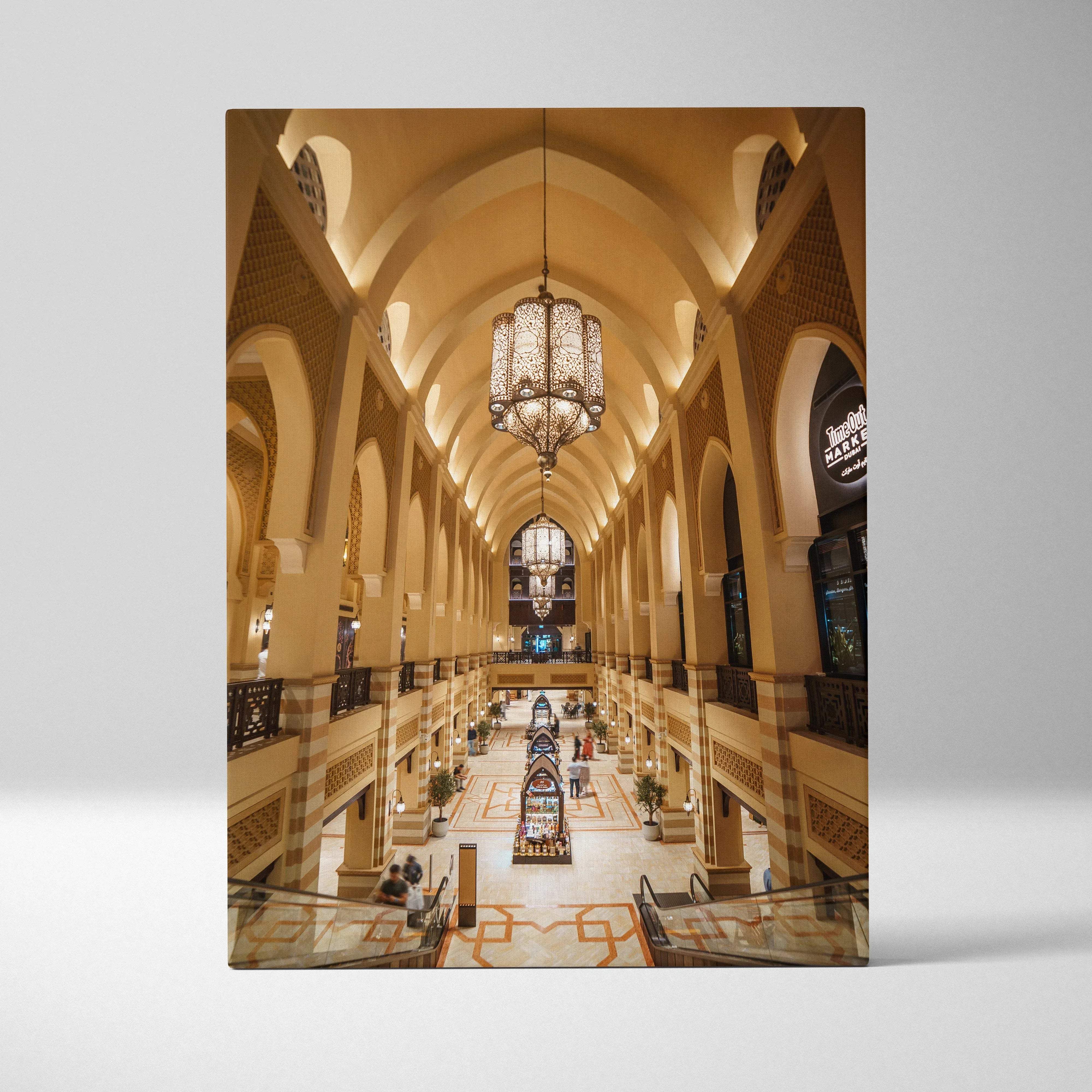Elegant architecture photography canvas wall art featuring a golden chandelier and iconic interior arches in warm tones