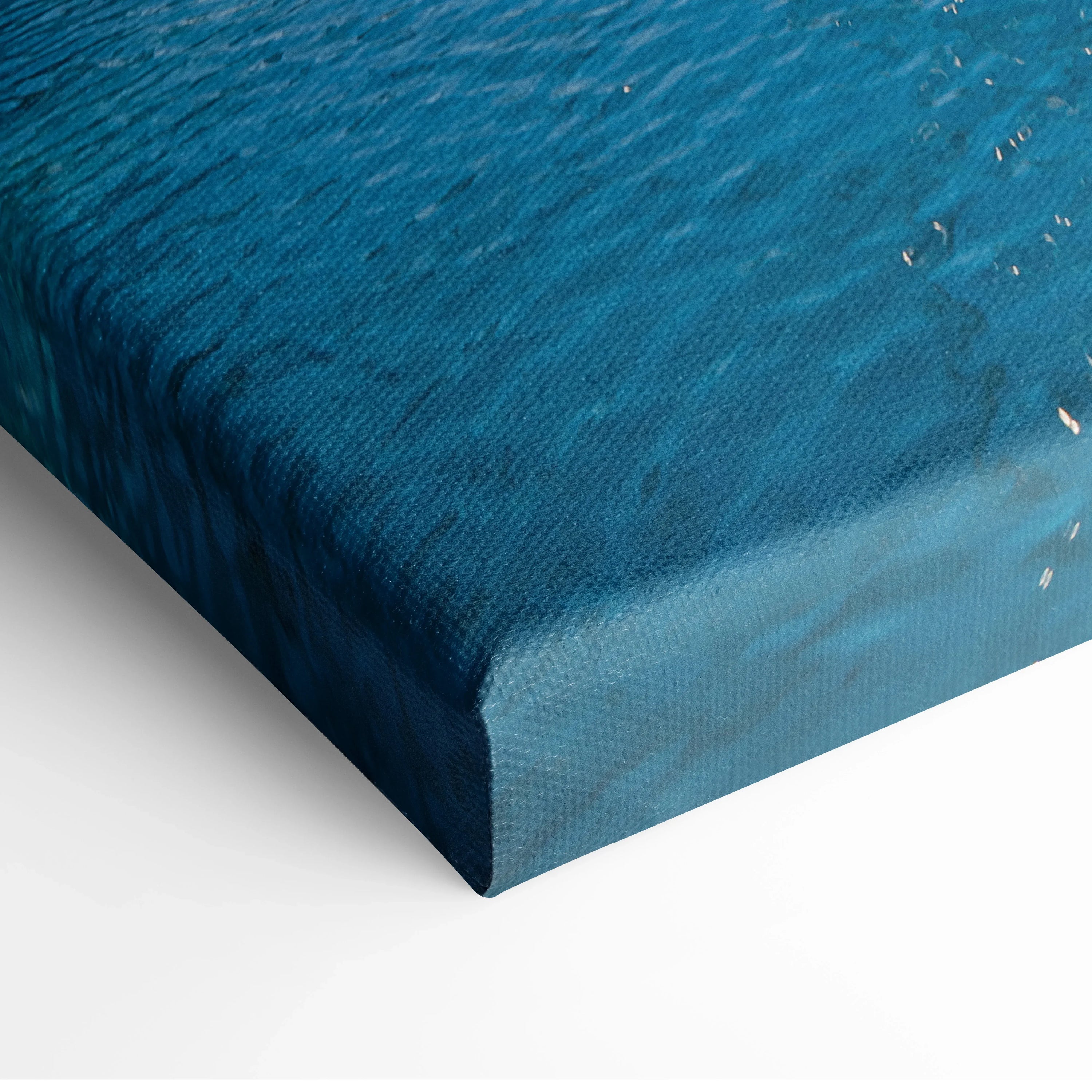 Blue textured canvas art with subtle architectural patterns and smooth edges.