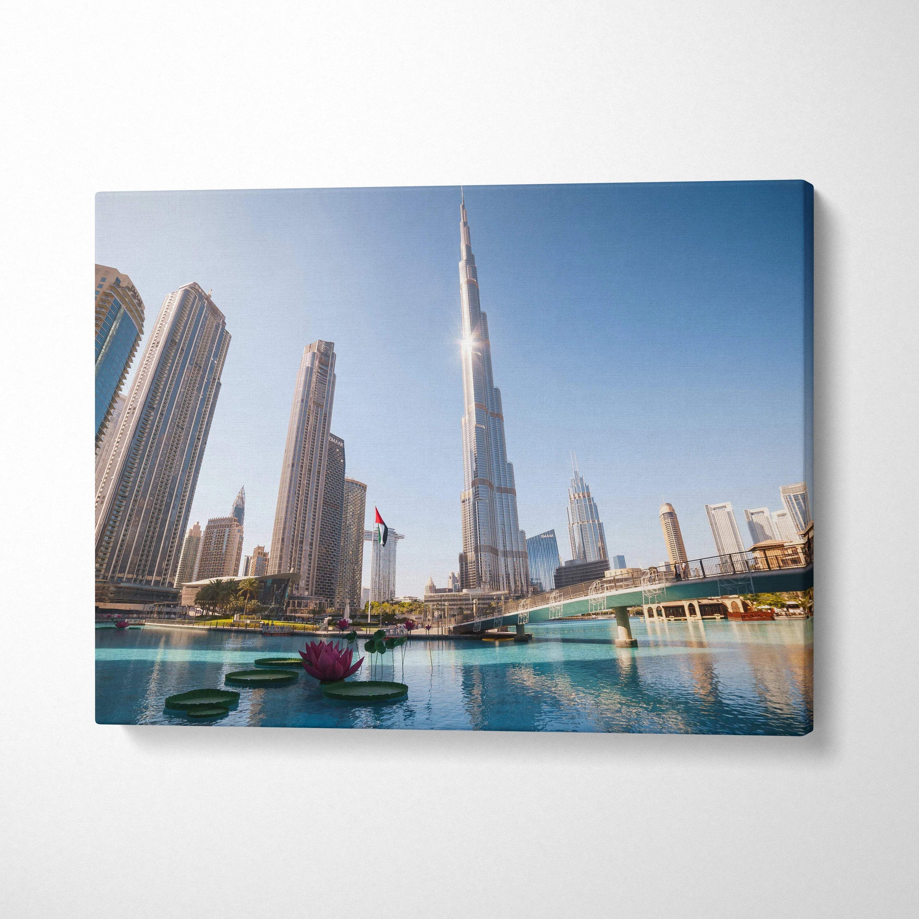 Canvas wall art featuring a digital art cityscape with tall modern buildings and a clear blue sky.