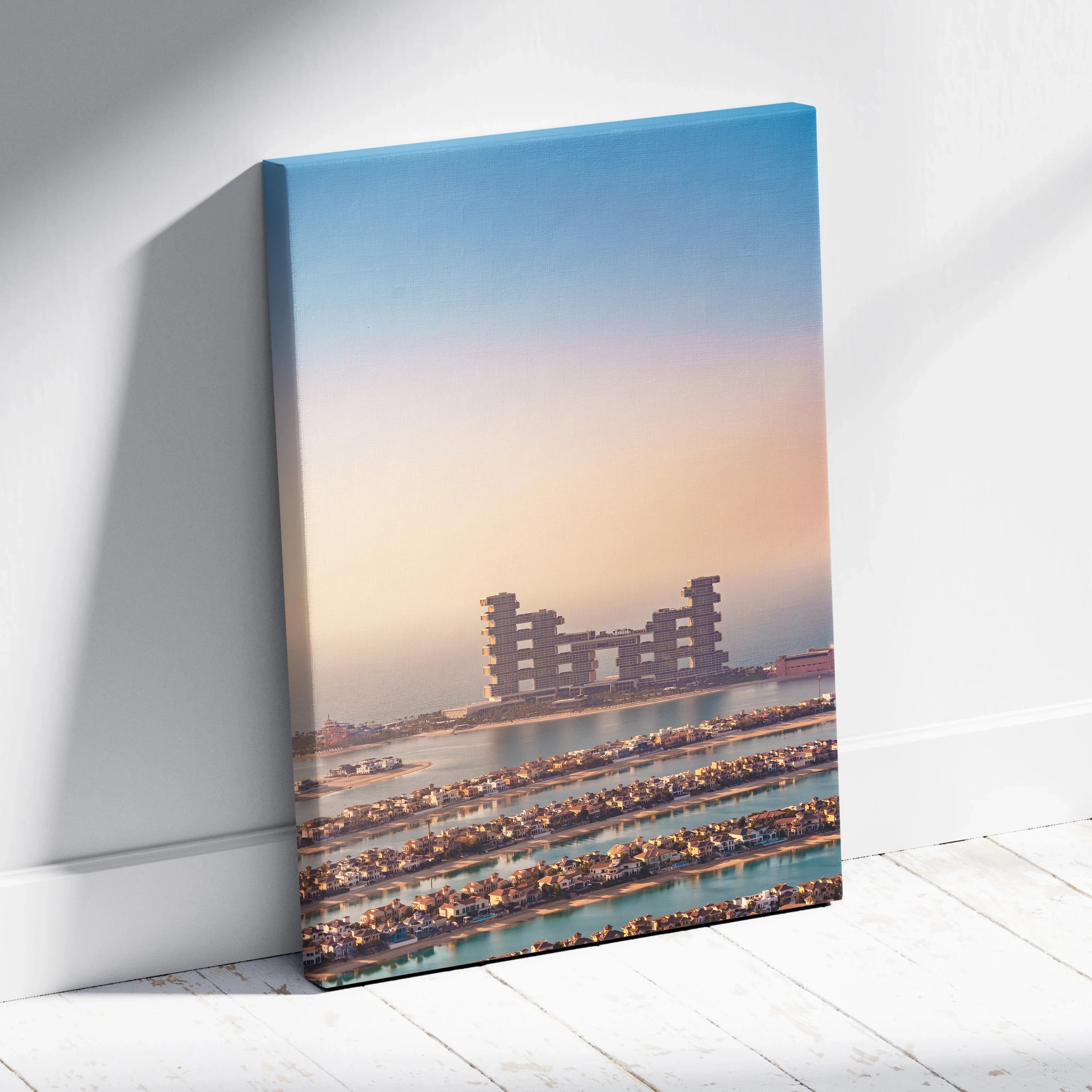 Canvas wall art print featuring high-resolution digital architecture with soft blue and peach sky tones above modern,.