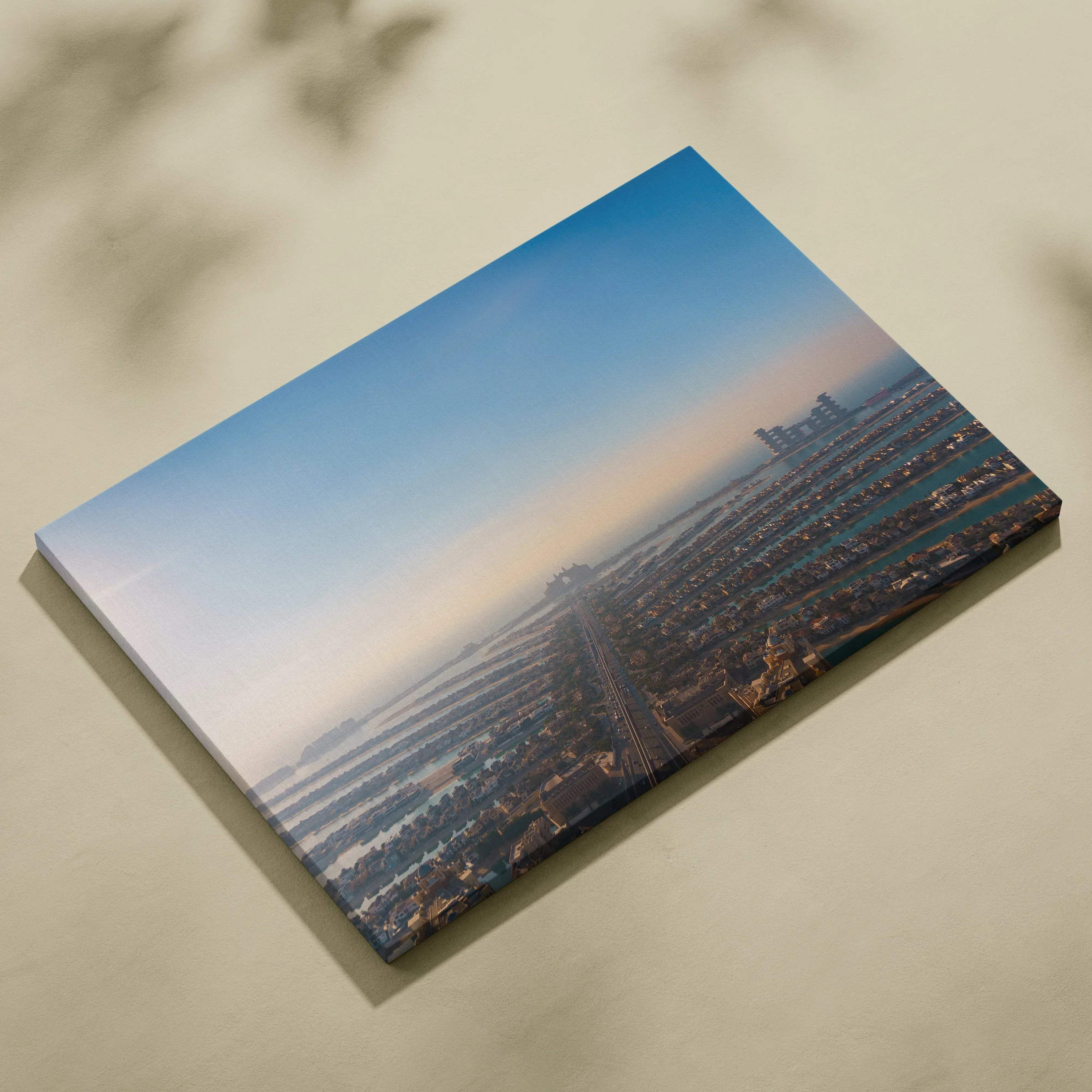 Canvas wall art print featuring a digital cityscape with buildings under a clear blue sky.