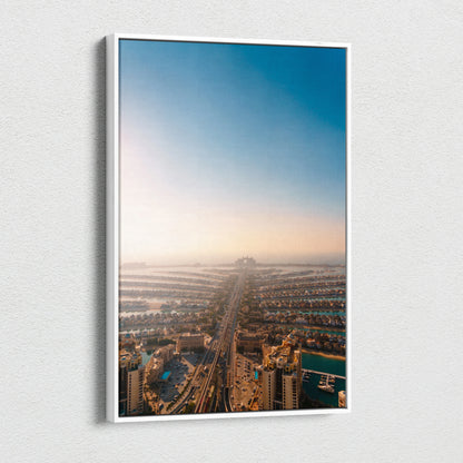 Vertical canvas wall art featuring a soft-focus urban landscape with buildings under a gradient blue sky.