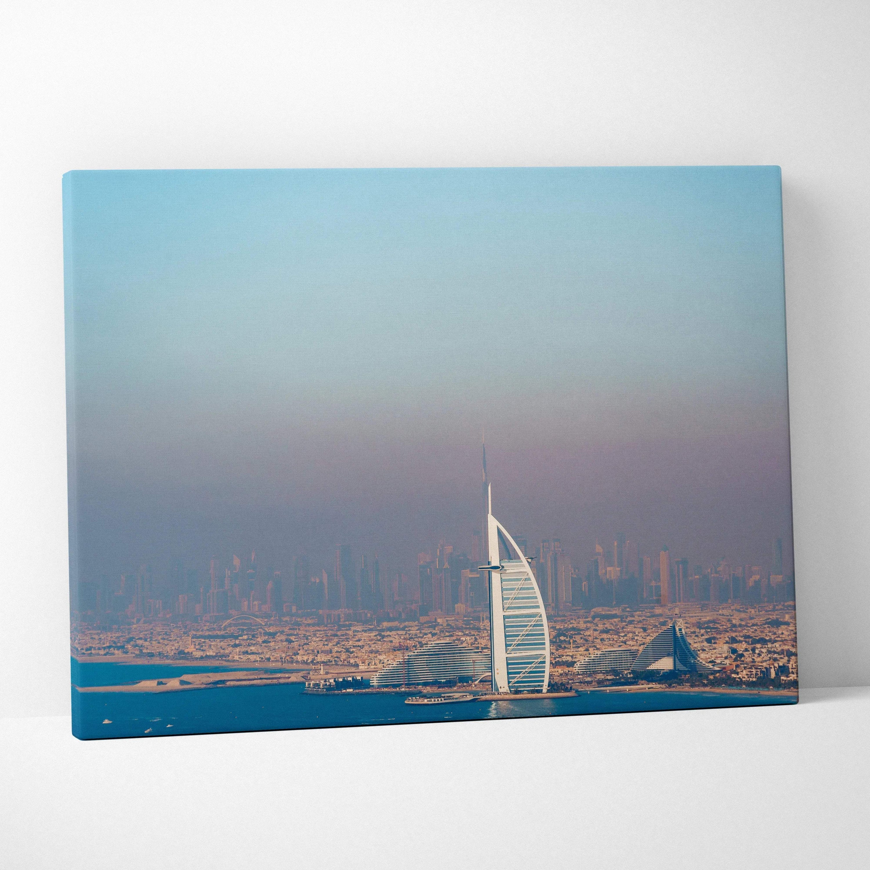 Canvas wall art featuring a high-resolution digital print of a modern skyscraper against a cityscape with clear blue sky and