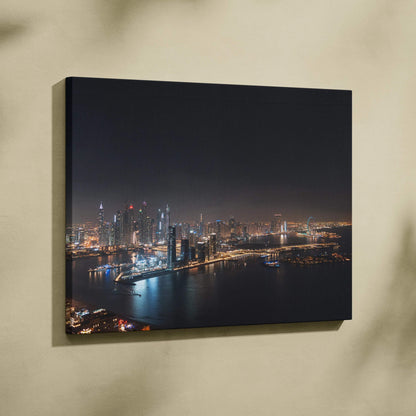 Nighttime city skyline with illuminated buildings and waterfront on canvas wall art.