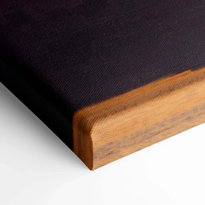 Black canvas art print stretched over a wooden frame corner with a smooth matte texture.