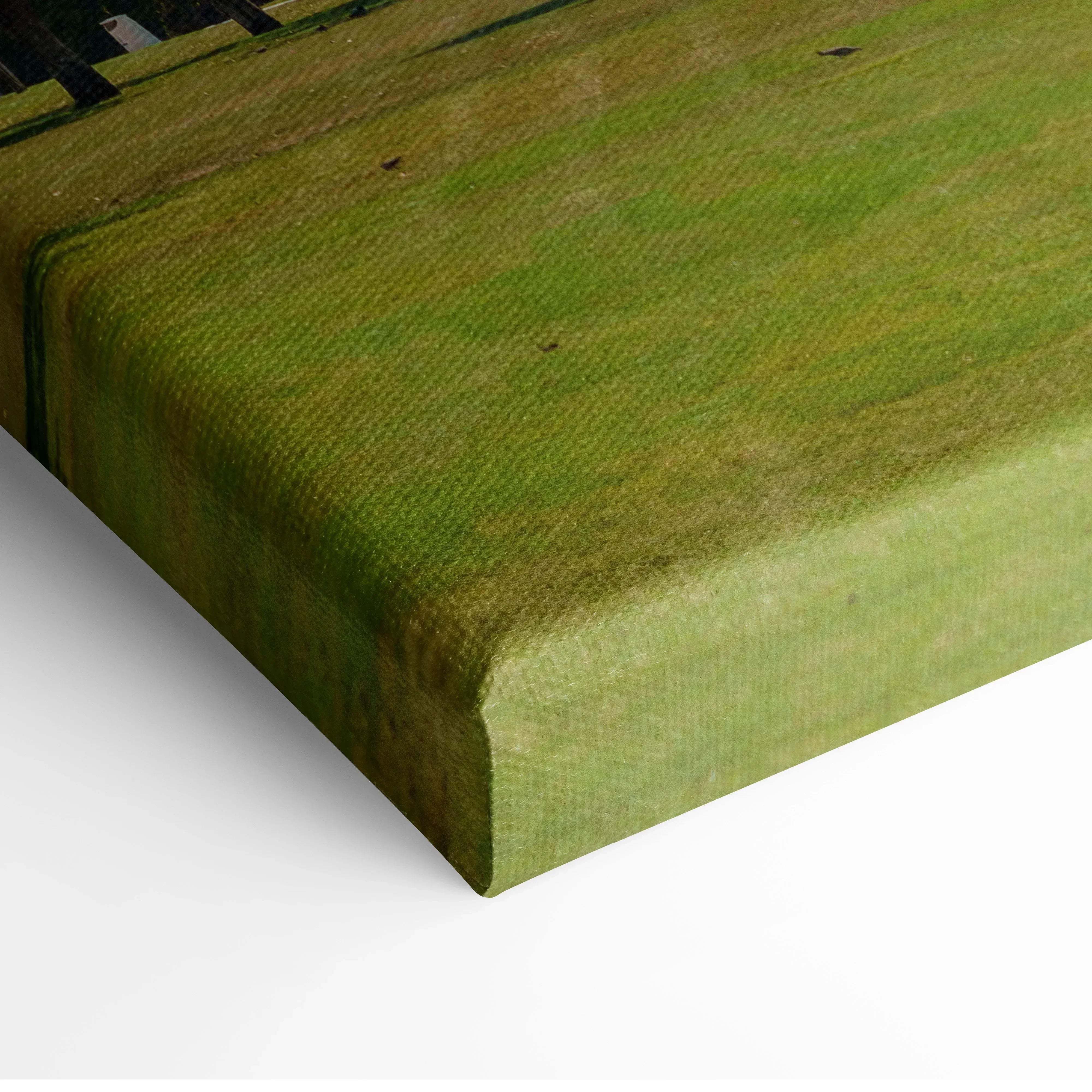 Green canvas print with textured surface and visible weave for architectural cityscape wall art in calm blue tones
