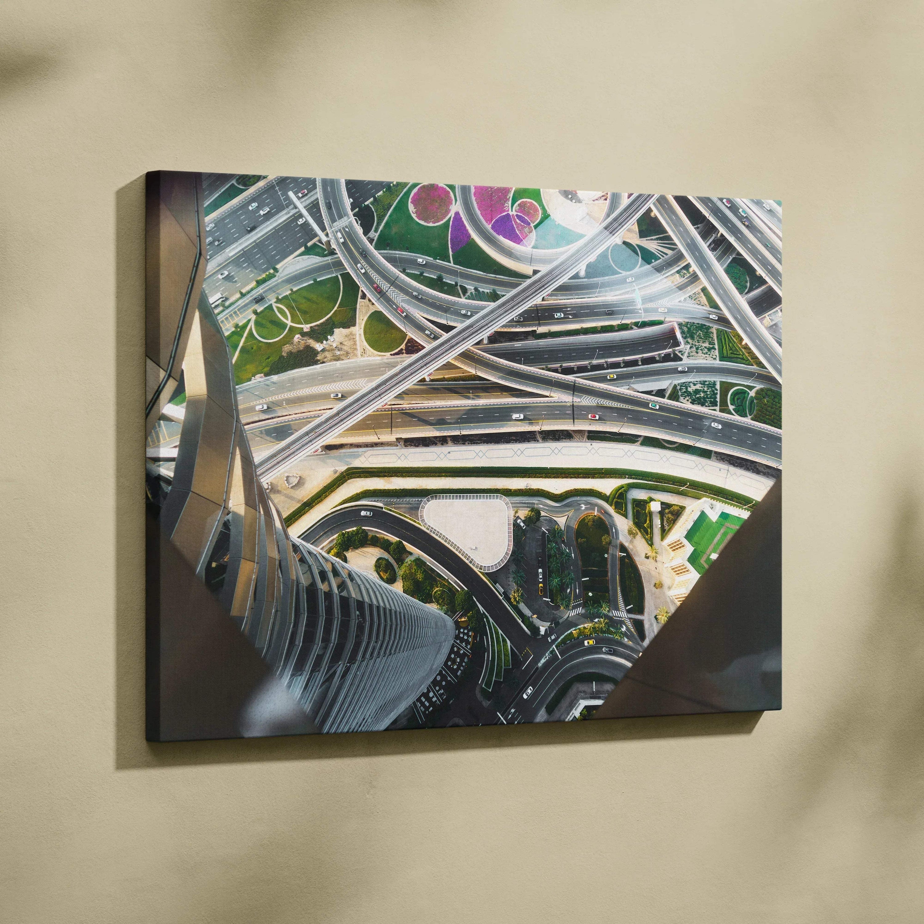 Canvas wall art print featuring aerial digital art of complex architecture with intersecting curved roads and green spaces.
