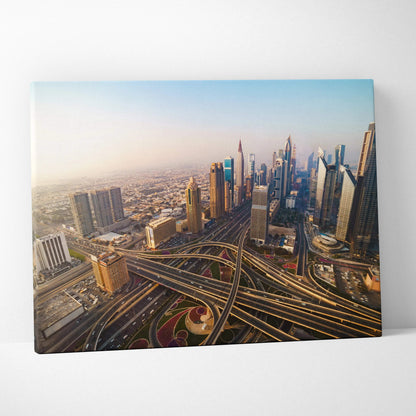 Canvas wall art featuring a digital aerial view of a sprawling cityscape with modern skyscrapers and intricate highway.