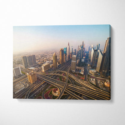 Cityscape aerial view of modern skyscrapers and highways printed on canvas wall art.