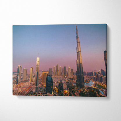 City skyline at dusk canvas wall art featuring modern skyscrapers and vibrant lights.