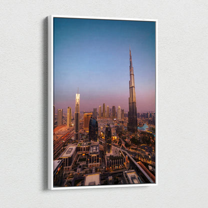 Tall canvas wall art featuring a cityscape with illuminated buildings at dusk, highlighted by the Burj Khalifa tower.