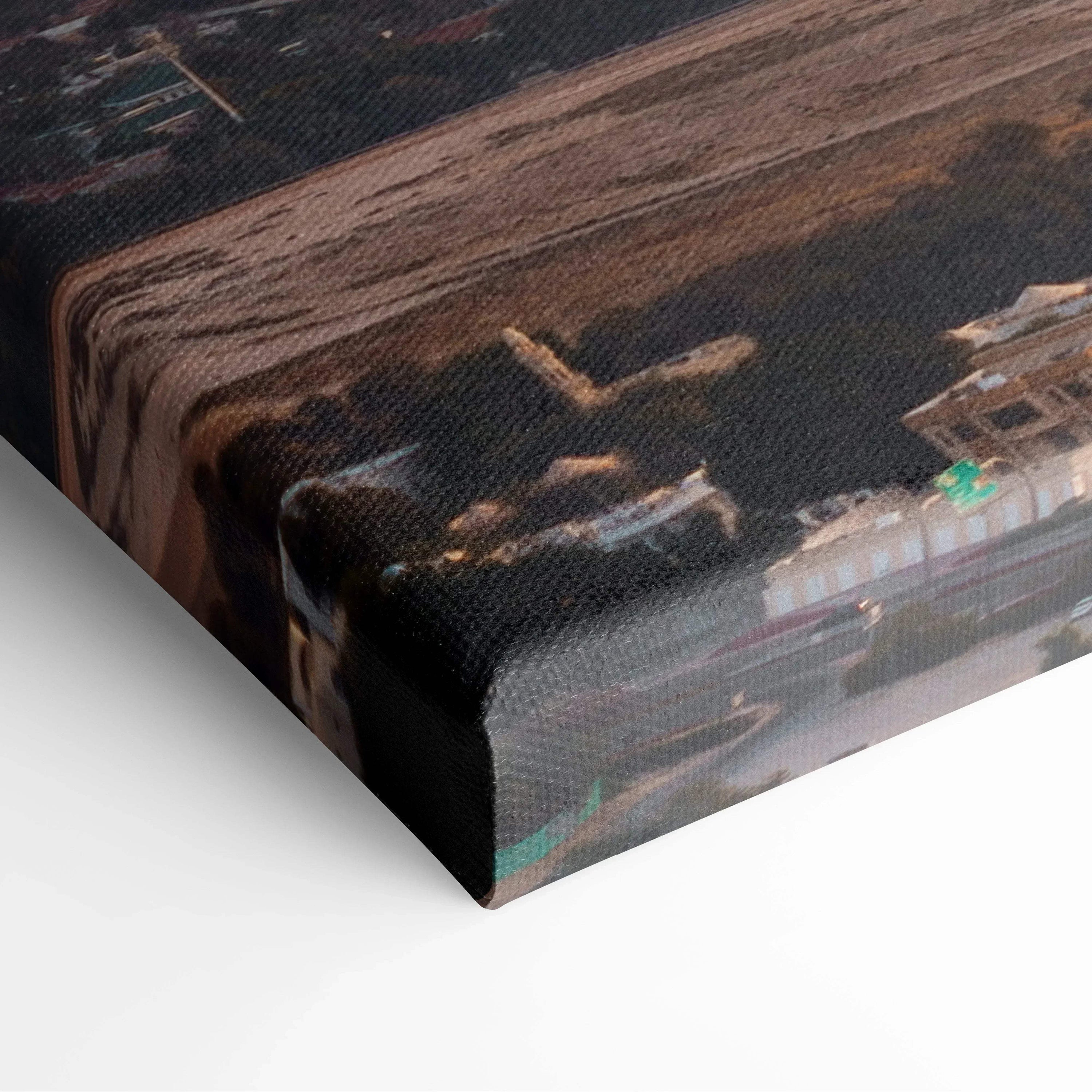 Close-up of canvas wall art showing textured fabric with abstract architectural design in dark brown and black tones.