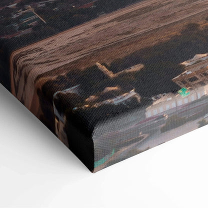 Close-up of canvas wall art showing textured fabric with abstract architectural design in dark brown and black tones.