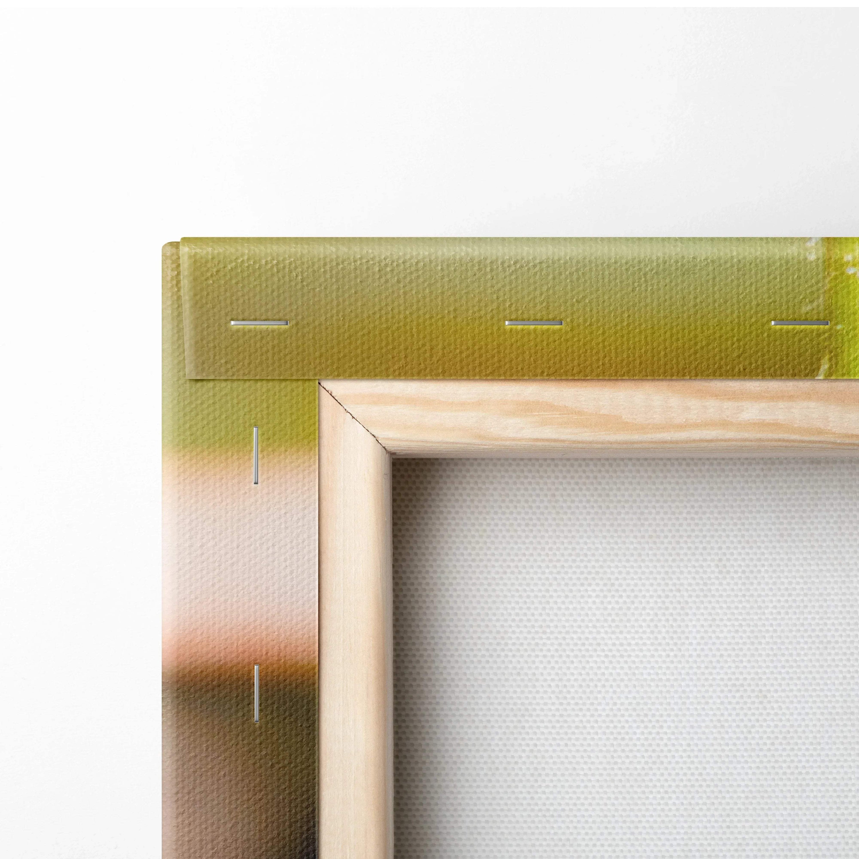 Close-up of stretched canvas corner with wooden frame and vibrant color print edges for wall art decor.