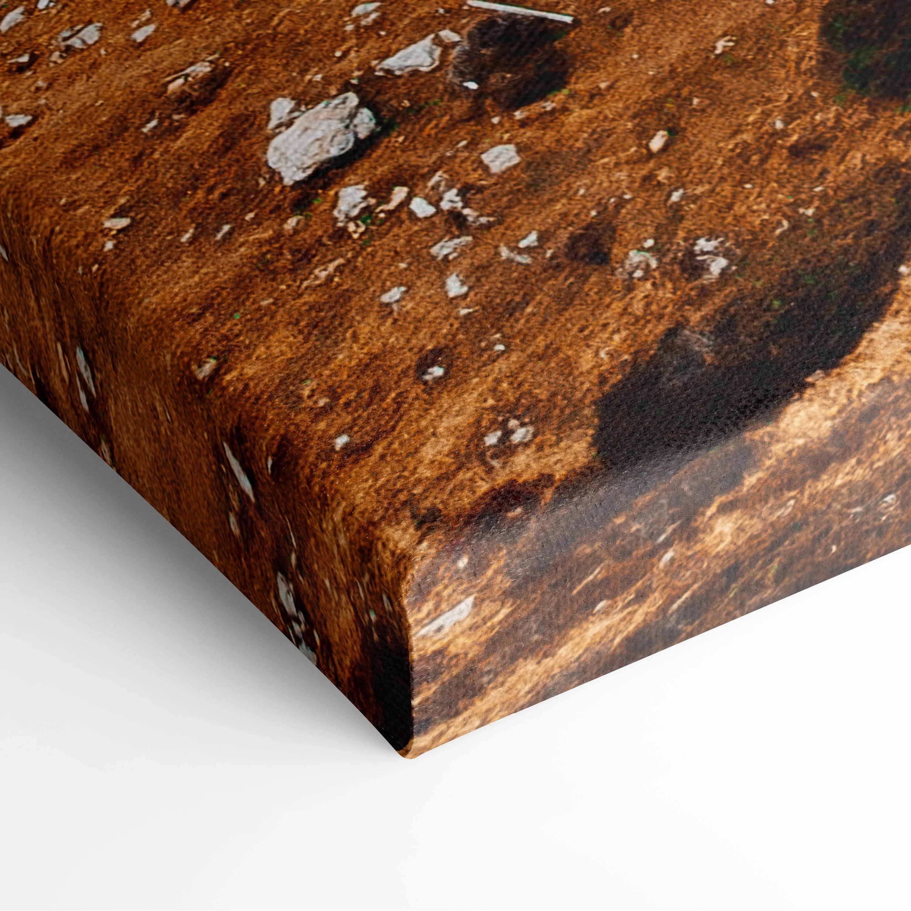 Close-up of autumn-themed digital art canvas with vibrant golden and brown foliage, wall art texture visible.