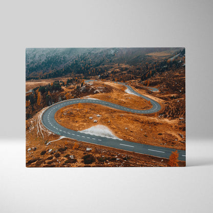 Autumn nature canvas art featuring winding mountain road with vibrant orange foliage wall art.