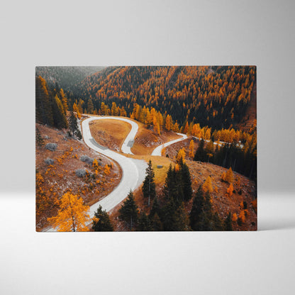 Autumn landscape canvas art with winding road and golden trees in vibrant fall colors.