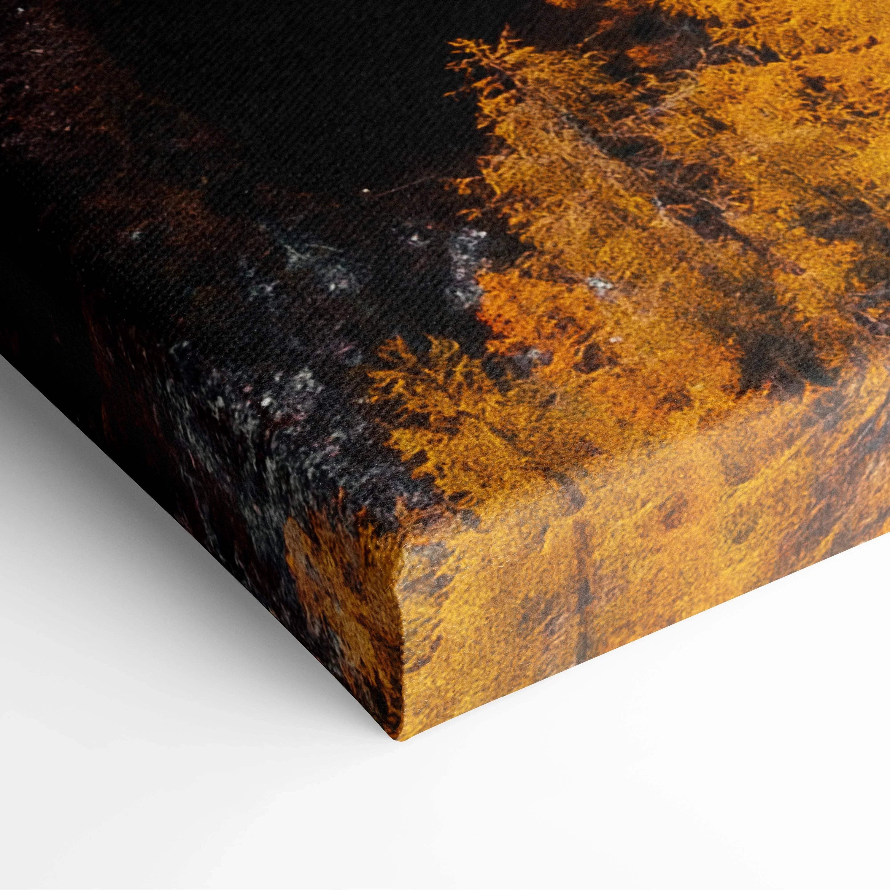 Close-up of autumn landscape canvas art featuring vibrant orange foliage and winding road detail on textured wall art canvas.