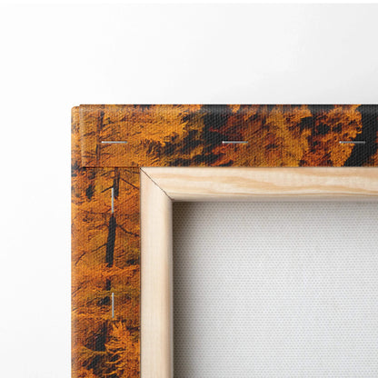 Close-up of wooden framed canvas art with vibrant autumn leaves and a winding road wall art.