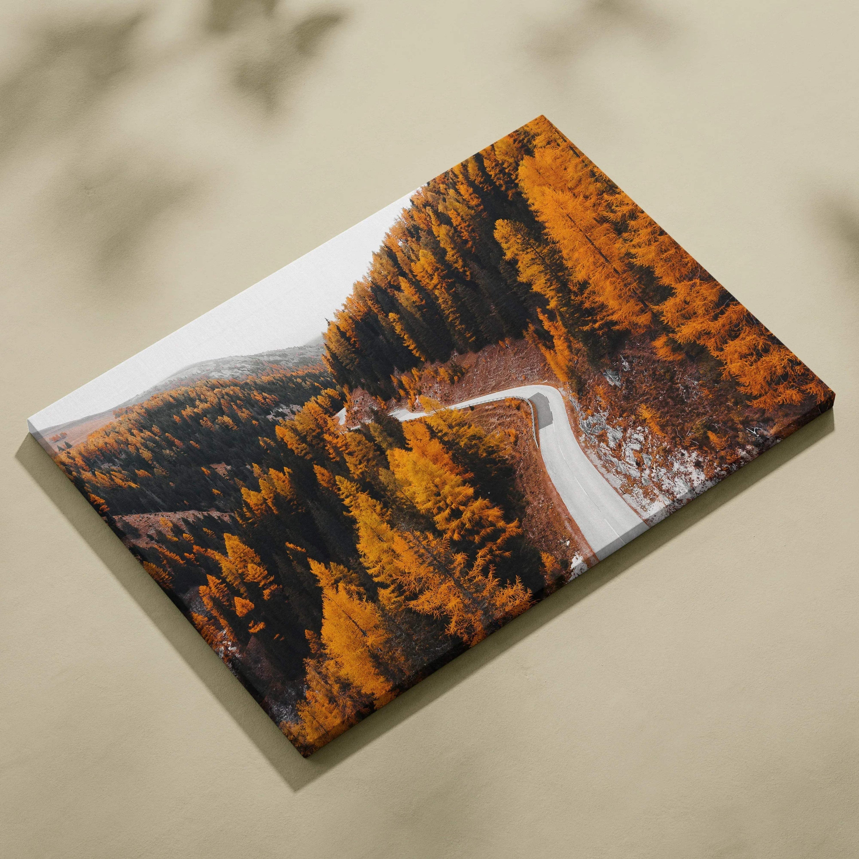 Autumn landscape canvas art with winding road through vibrant orange and yellow fall foliage wall art.