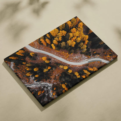 Canvas art of a serene winding road through golden autumn trees, vibrant fall wall art.